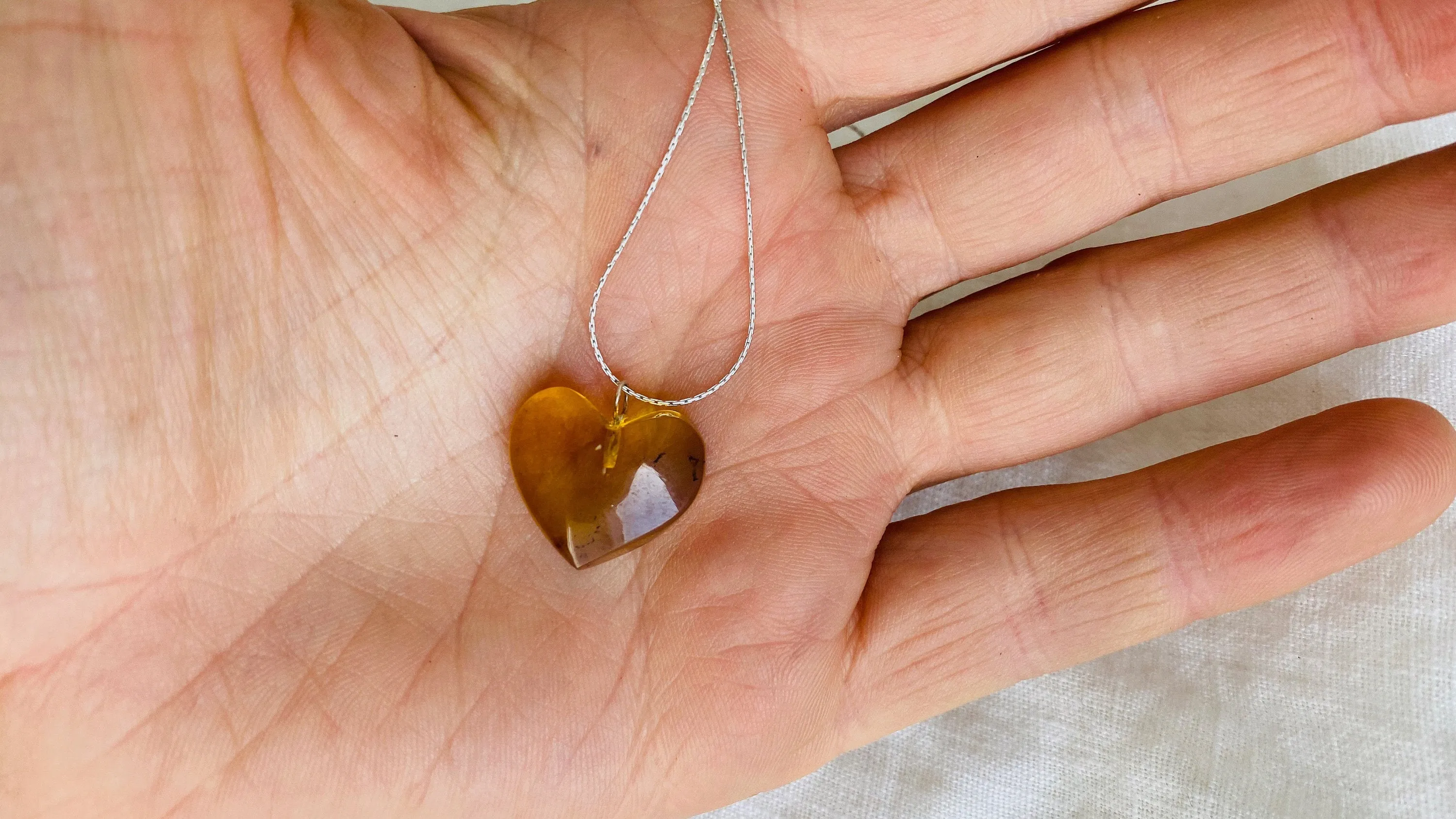 Amber Heart Pendant on a Silver Chain. Atelier Aadya