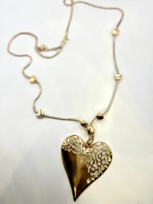 Large  Abstract Cut Out Heart Long Gold Necklace