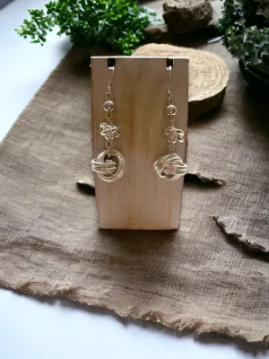Whimsical Knots: Dangle Bead Elegance Earrings